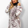 Anya beige coat with dark beige textured print.