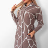 Babett dark beige coat with white giraffe print.