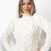 Dolli white cable knit turtleneck sweater.