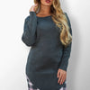 Model wearing Karola knit dress with subtle elegance.