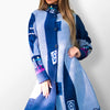 Kira soft navy minimalist coat for effortless style.