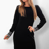 Full view of Lilla dress in elegant black.