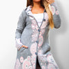 Anica gray hooded coat with pockets and floral accents.
