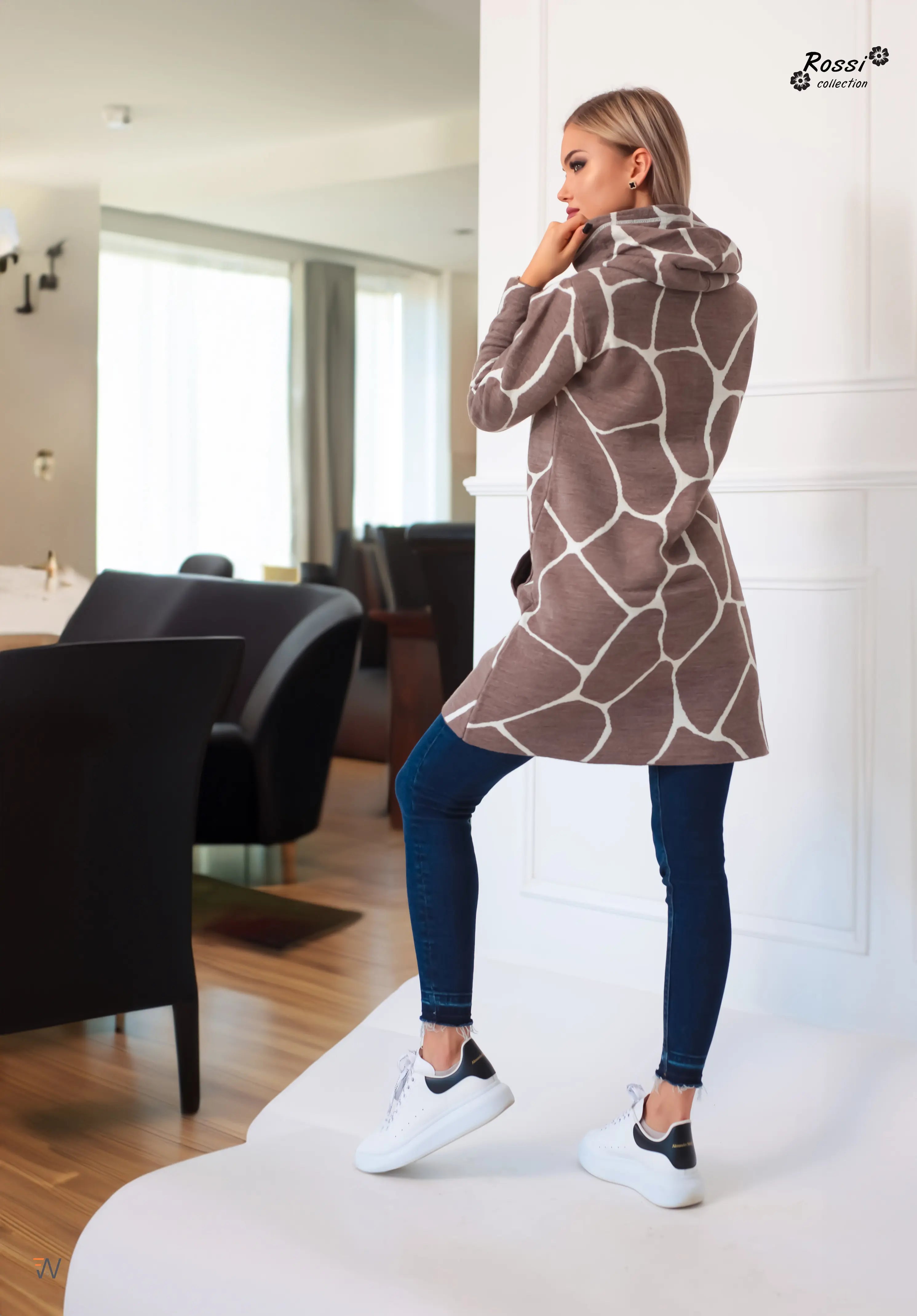 Classic Babett coat styled for formal occasions.