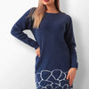 Selena navy knit dress with white ripple pattern.