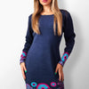 Szonja navy knit dress with floral pattern.